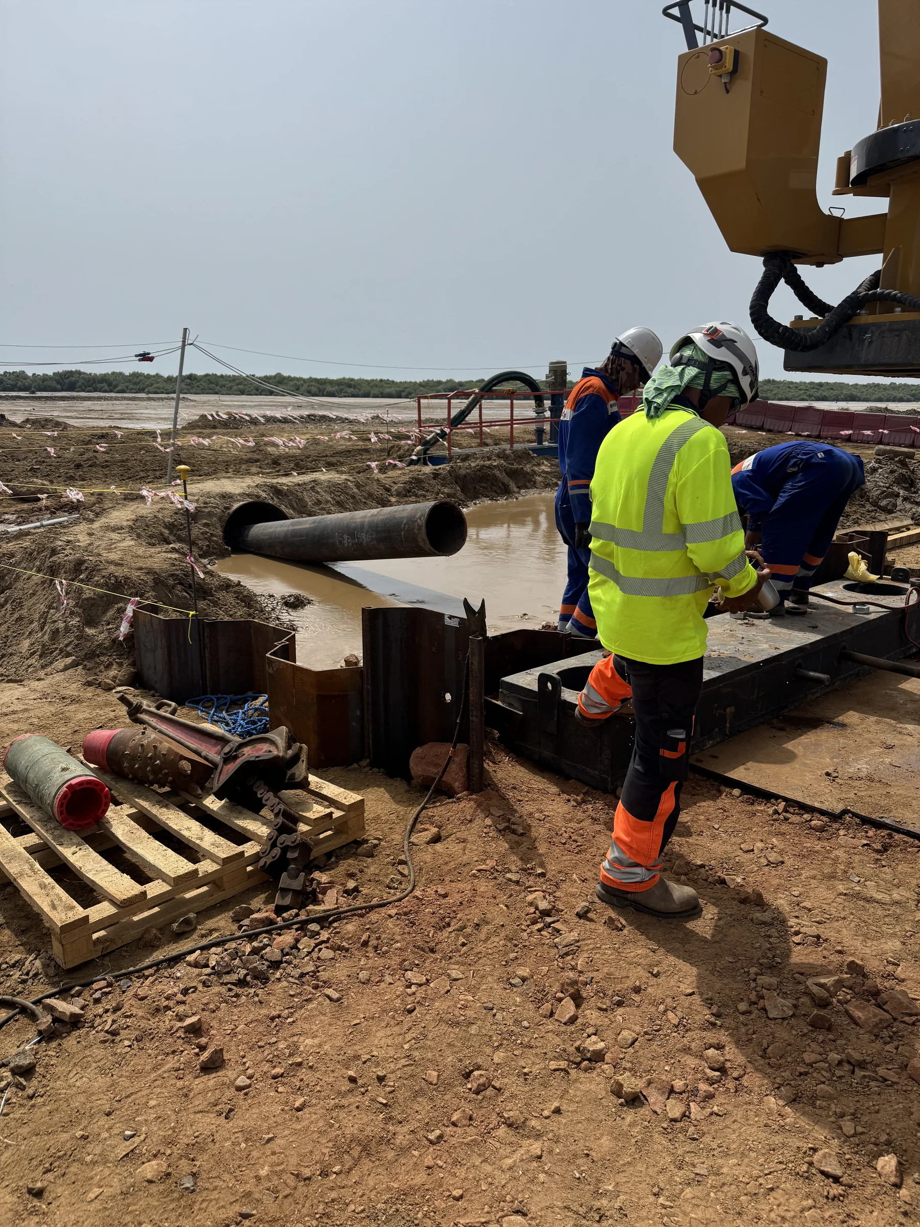 HDD shore approach. Pipe string prepared at the punch-out point.