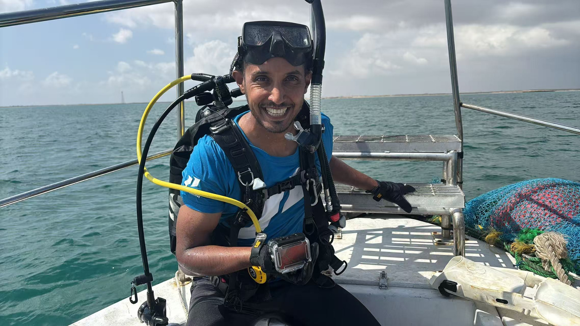 Survey diver preparing to enter the water, Red Sea.